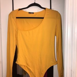 Asymmetrical bodysuit